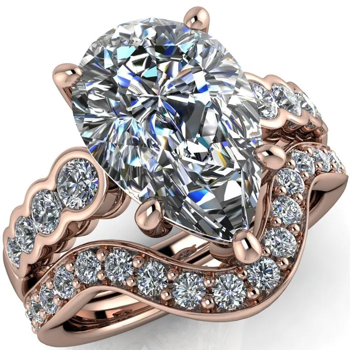 Calypso Pear Center Stone 5 Prong Shared Bezel Shank Engagement Ring Fire Brilliance Rings Calypso Pear Center Stone 5 Prong Shared Bezel Shank Engagement Ring Fire Brilliance Rings