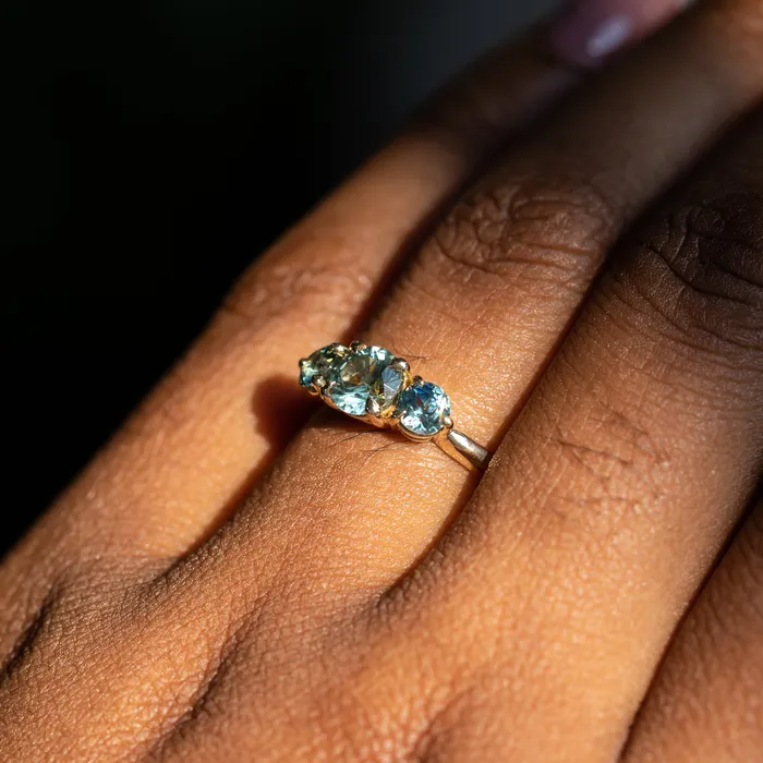 075ct Round Montana Sapphire and 070ct Round Madagascar Sapphires Three Stone Ring in 14K Yellow Gold Discovery Gems Rings