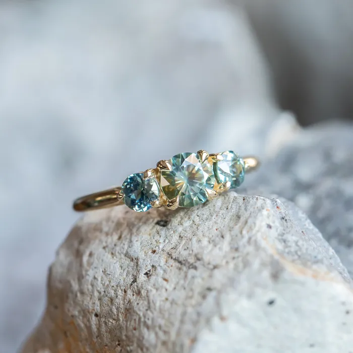 075ct Round Montana Sapphire and 070ct Round Madagascar Sapphires Three Stone Ring in 14K Yellow Gold Discovery Gems Rings