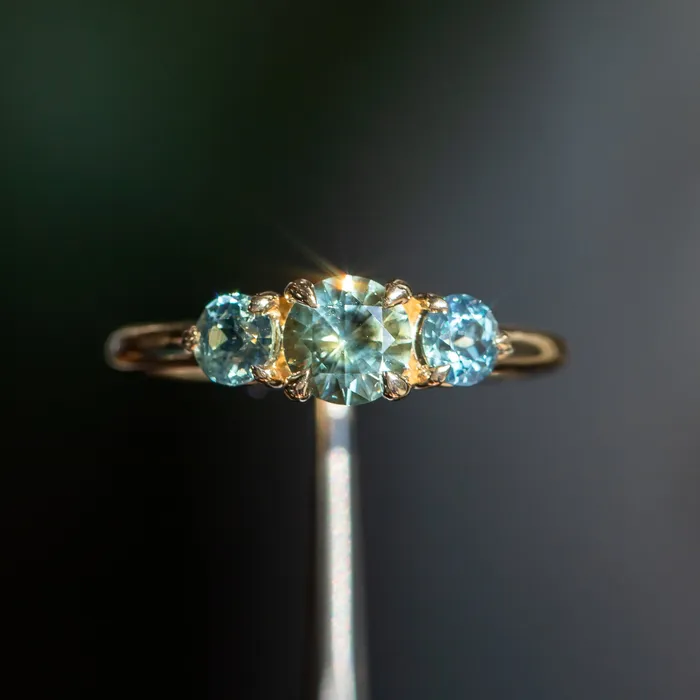 075ct Round Montana Sapphire and 070ct Round Madagascar Sapphires Three Stone Ring in 14K Yellow Gold Discovery Gems Rings