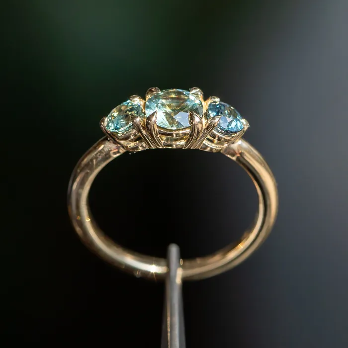 075ct Round Montana Sapphire and 070ct Round Madagascar Sapphires Three Stone Ring in 14K Yellow Gold Discovery Gems Rings
