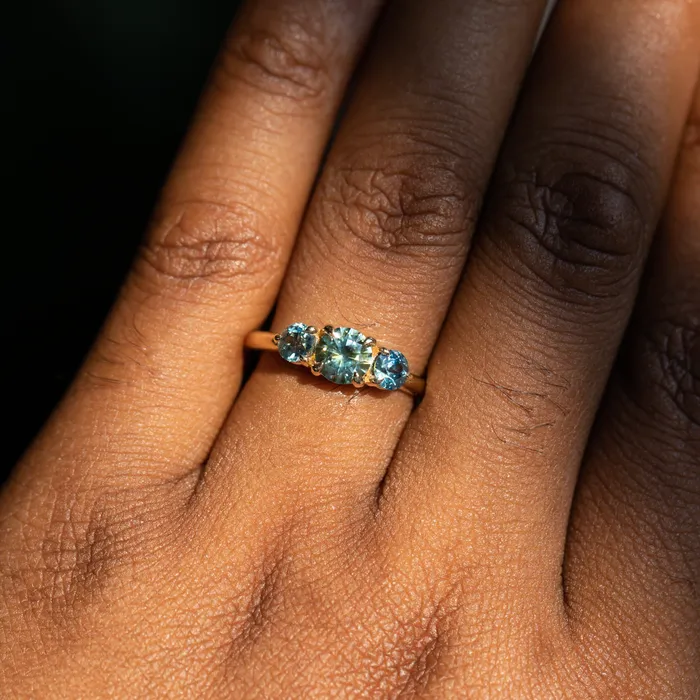 075ct Round Montana Sapphire and 070ct Round Madagascar Sapphires Three Stone Ring in 14K Yellow Gold Discovery Gems Rings