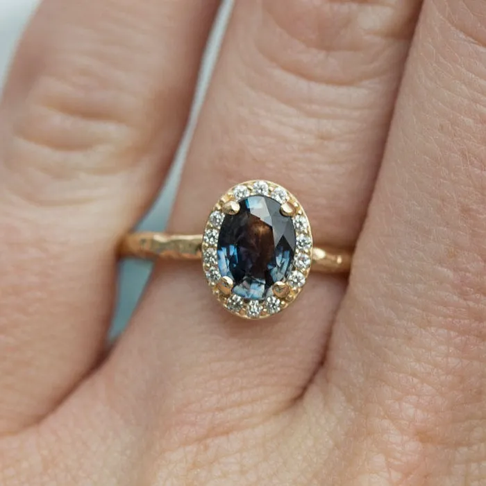 Color Changing Blue Sapphire Engagement Ring in Hand Carved Recycled Yellow Gold Earthy Setting Sapphire Engagement Ring by Anueva Jewelry Anueva Jewelry Rings Color Changing Blue Sapphire Engagement Ring in Hand Carved Recycled Yellow Gold Earthy Setting Sapphire Engagement Ring by Anueva Jewelry Anueva Jewelry Rings