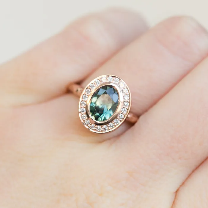 Rings Anueva Jewelry Oval Bezel Set 149ct Color Changing Teal Sapphire and Diamond Halo Engagement Ring 14k Rose Gold Evergreen Band