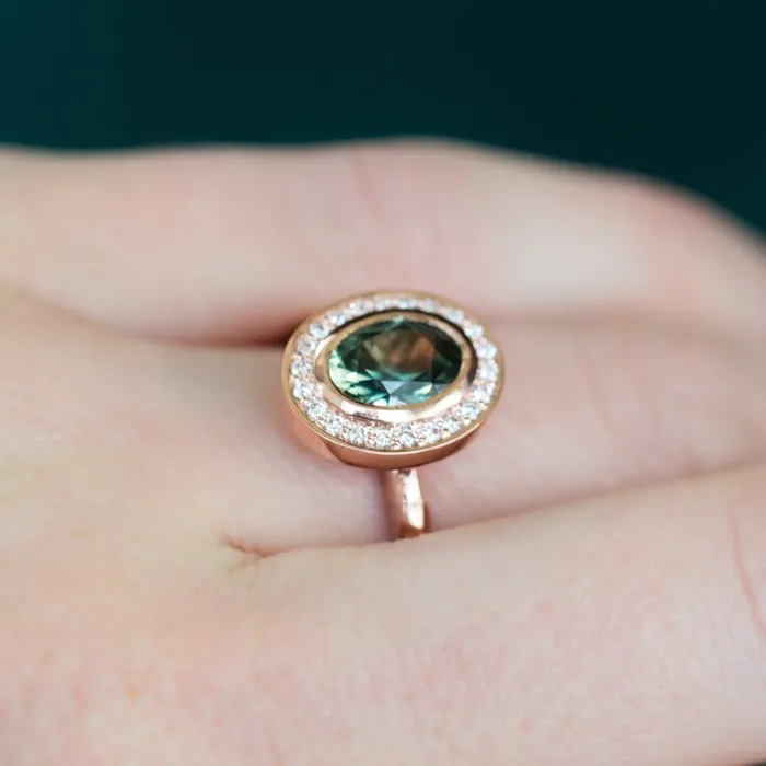 Rings Anueva Jewelry Oval Bezel Set 149ct Color Changing Teal Sapphire and Diamond Halo Engagement Ring 14k Rose Gold Evergreen Band
